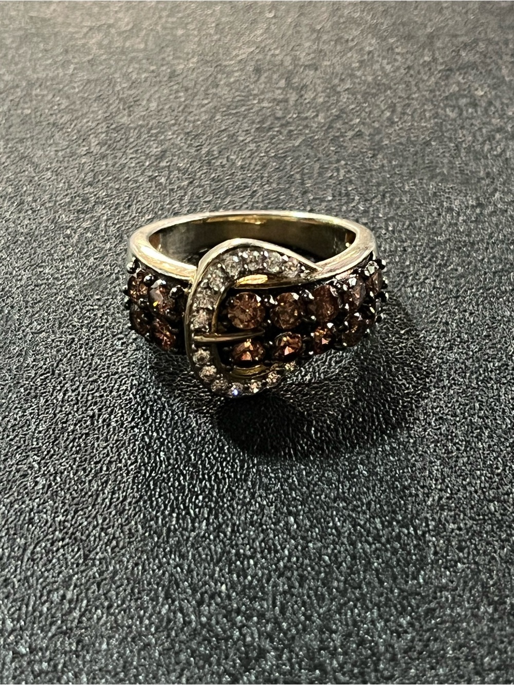 Brown Crystal Belt ring with clear stone buckle. Neat piece. Sz 7.